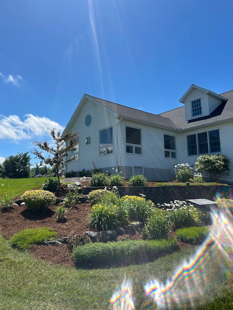 Beautiful landscaping with garden beds and plants